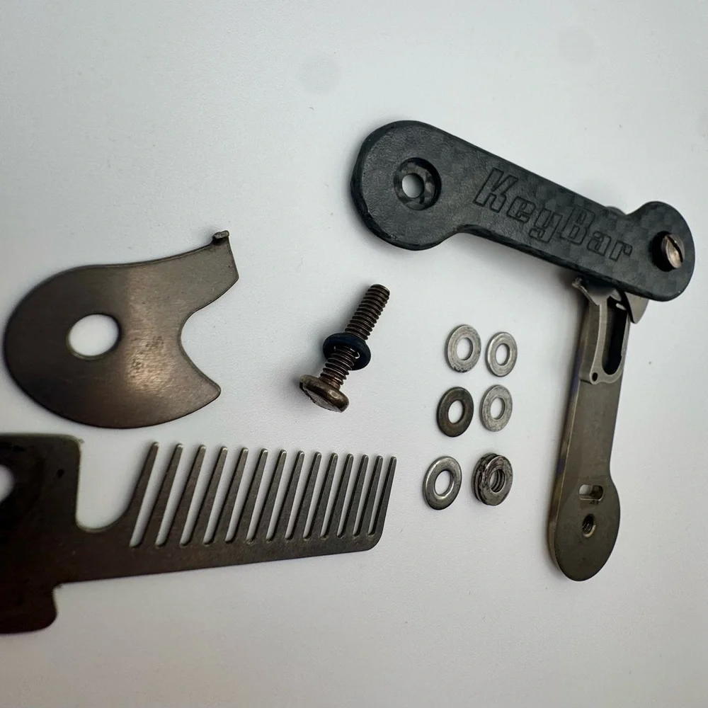 Black Carbon Fiber and Silver Titanium Key Holder by KeyBar